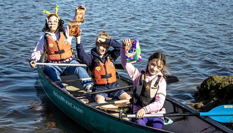 Children on a canoe Easter Egg Hunt with New Forest Activities
