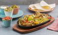 Sizzling Mexican dish served at Las Iguanas restaurant