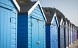 Row of blue beach huts