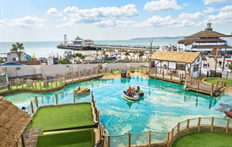 Overhead shot of the stunning smugglers crazy golf with Bournemouth beach and pier in the background