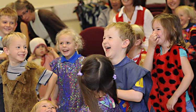 children enjoying storytelling