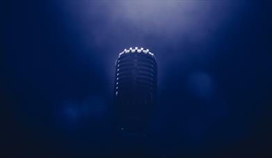 Microphone in blue smoke