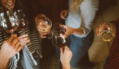 People drinking wine together