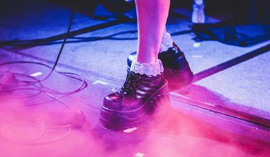 Black platform boots with lace socks