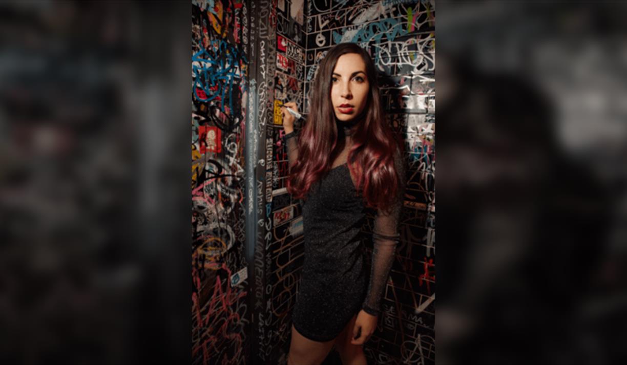 Caitlin Cook: The Writing On The Stall