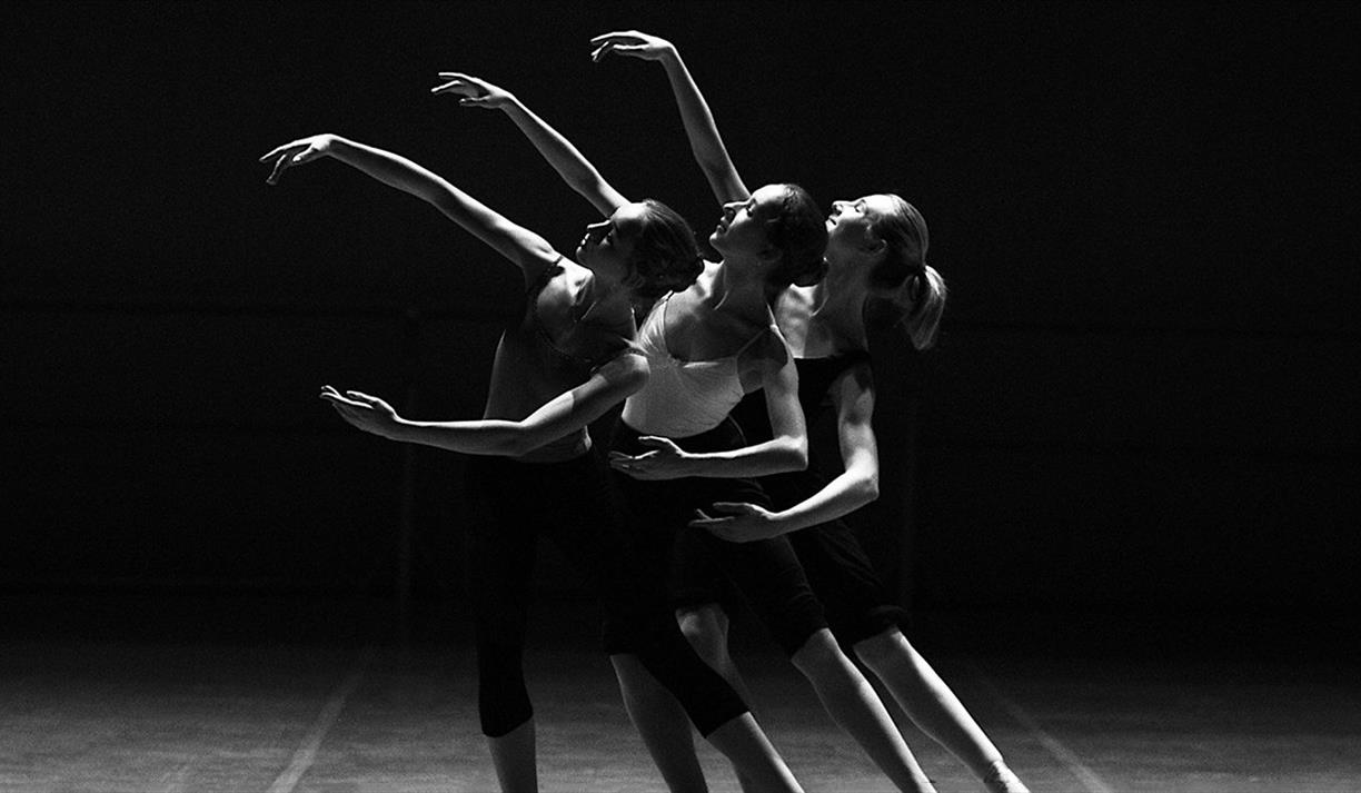 Three women ballet dancing