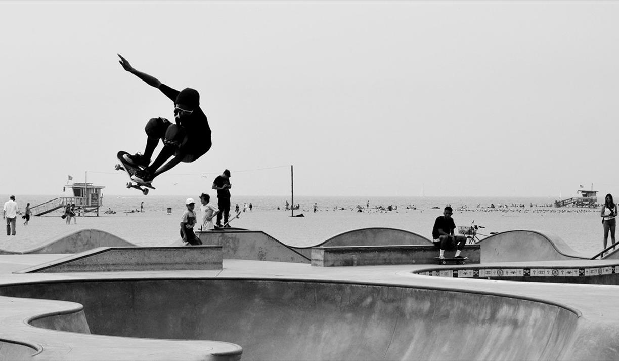 Man skateboarding in a skateboard park