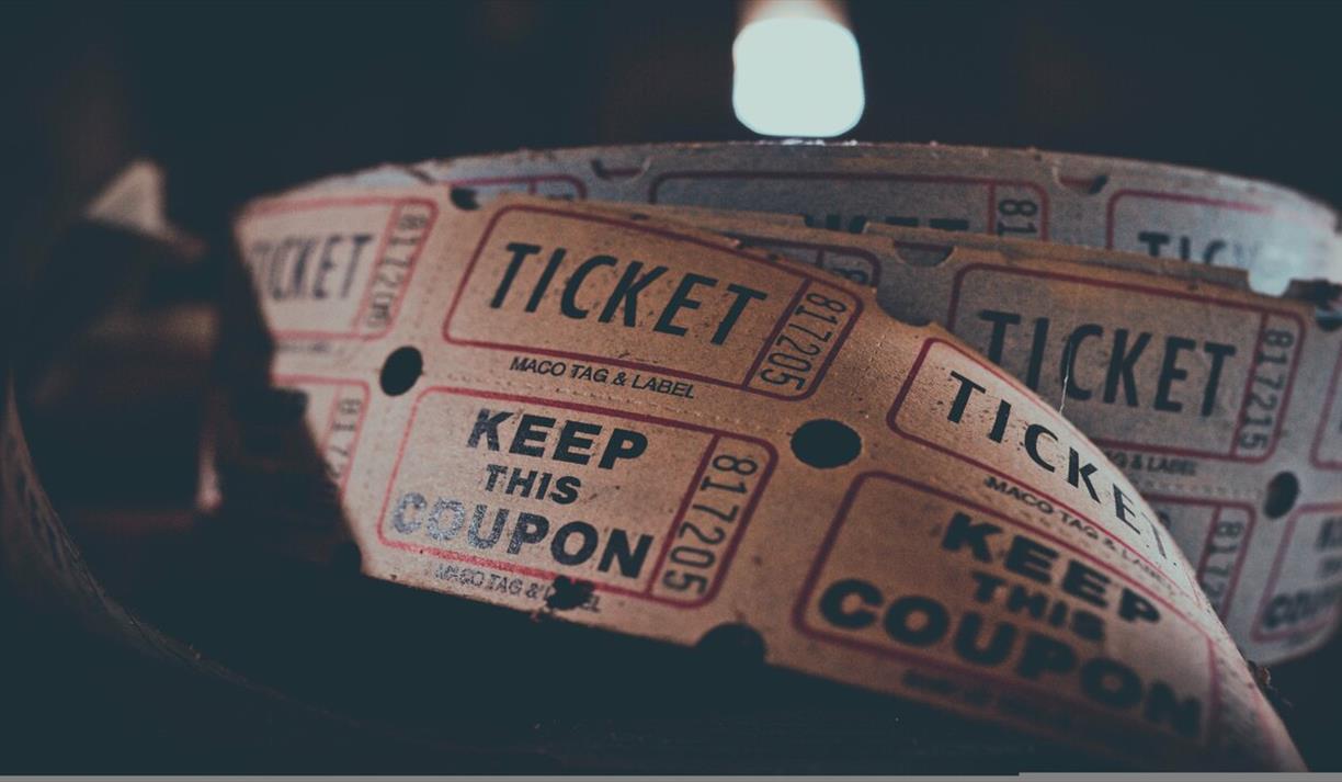 Close up of a roll of tickets for a show