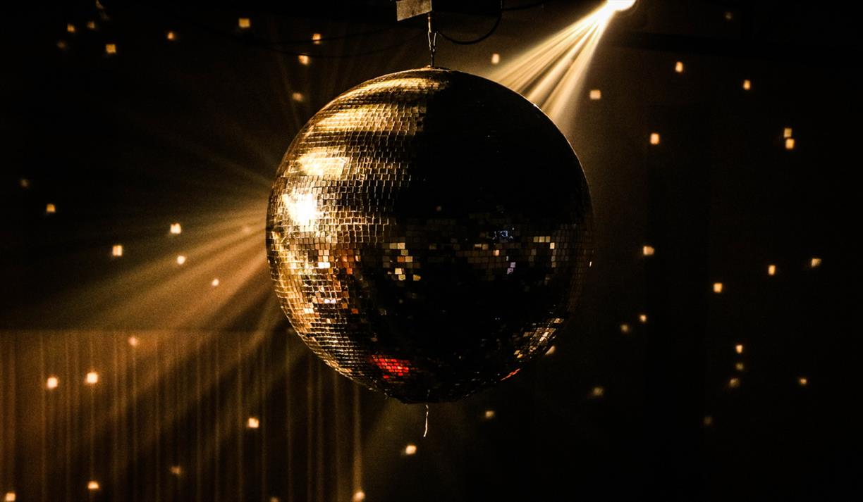 Glitterball in gold light