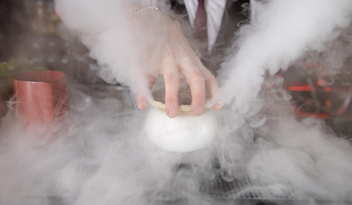 Steaming pot of food.