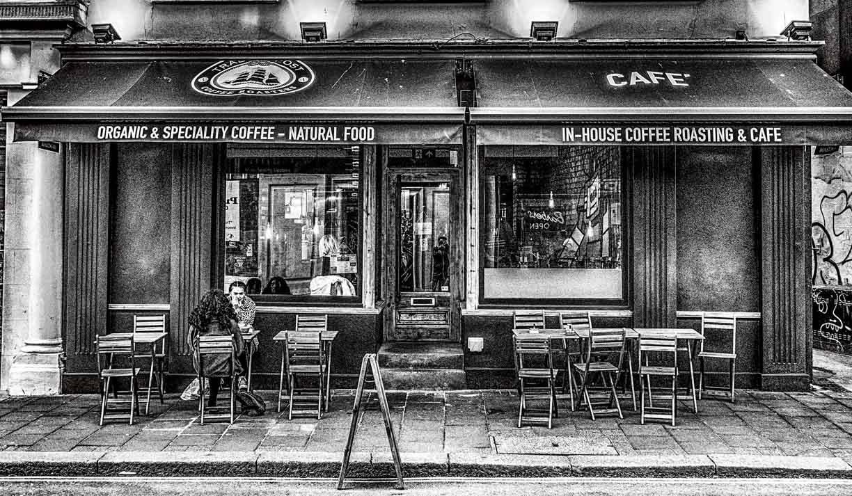 Black & white photo of the exterior of Trading Post Coffee