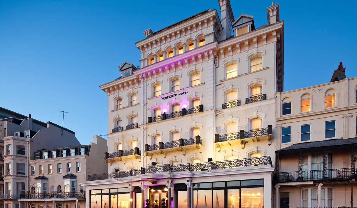 Exterior photo of the Mercure Brighton hotel taken at dusk