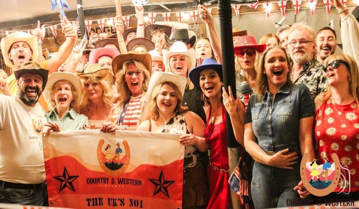 Partygoers enjoying the Country & Western event which will be held at Brighton Racecourse in February.