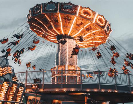 Fun fair ride with bright lights