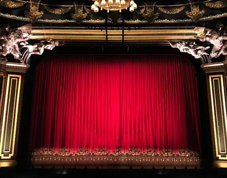 Red curtain at a performance theatre