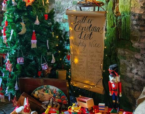 Christmas tree display with naughty and nice list