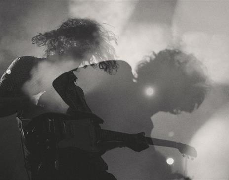 Man playing a guitar