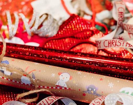 Red and white wrapping paper with ribbons