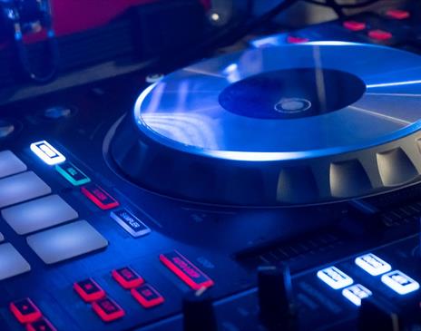 Blue lit turntable with white and red lights