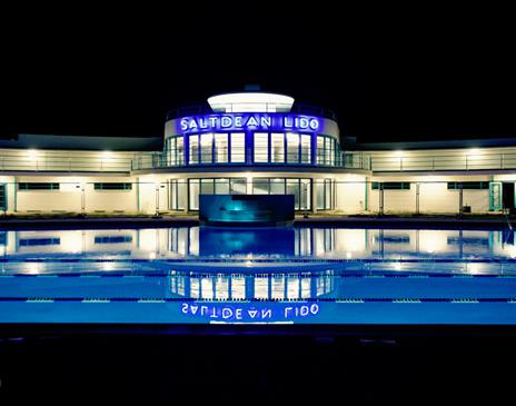 Saltdean Lido lit up at night