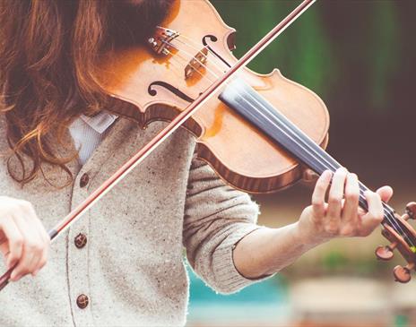 Person playing a violin