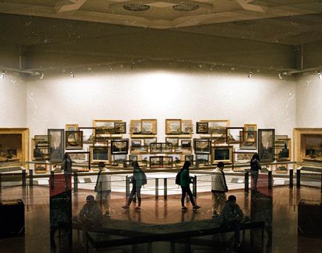 People looking at art in a museum