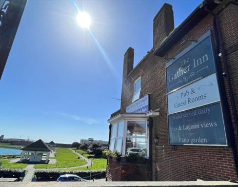 Outside The Gather Inn with the view of the lagoon.