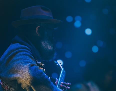 Man playing a guitar