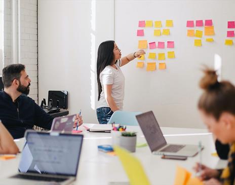 Woman leading a group meeting