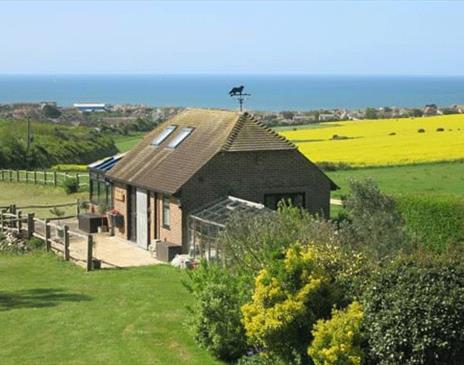 The old stable building with sea view