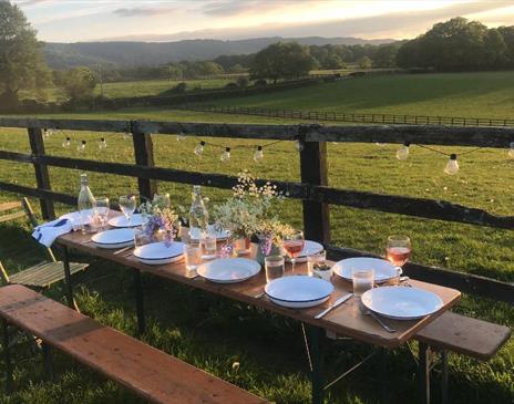 Woodfire Camping - dinner with a view