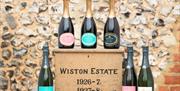 Bottles of Wiston Wine on crates.