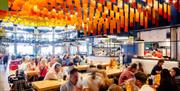 A busy Shelter Hall, Brighton in full service from their seven resident kitchens.