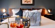Cocktails in the bedroom.