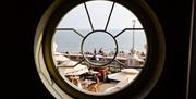 A view of the sea from inside Shelter Hall Brighton's beautiful window.