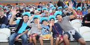 Sussex Cricket - spectators waving