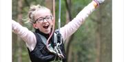 Branching Out Adventures - girl on zip wire