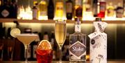 Slake Spirits - drinks and bottles on the bar