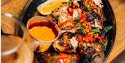 A delicious platter of BBQ chicken at Shelter Hall, Brighton