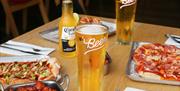 Beer and pizza at Bench bar