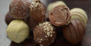 Sections of dark, milk and white truffles