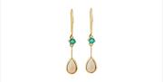 Gold ear rings with green stones