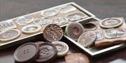 Chocolate buttons, with ornate details