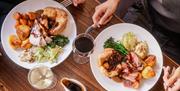 Roast dinner with red wine.