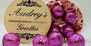 Packet of Griottes, wrapped in pink foil