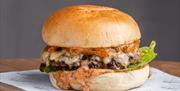 A delicious burger from one of Shelter Hall, Brighton's kitchens.