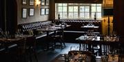 The cosy, inside dining area at The Ginger Fox.