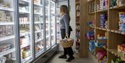 A shopper in the deli at Novellino