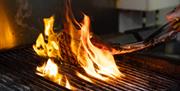 Flame grilled ribs.