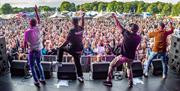 Live band performing at the Foodies Festival 2025